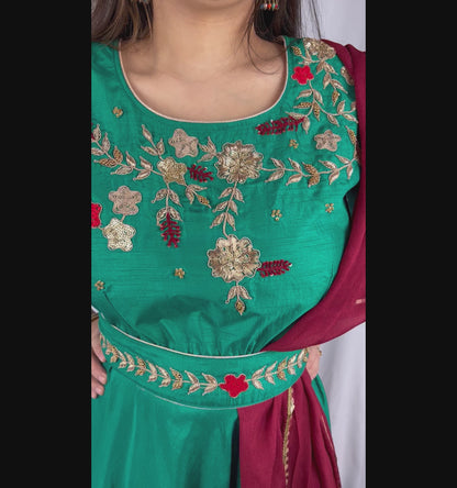 Green color hand embroidered long dress with belt and Maroon dupatta