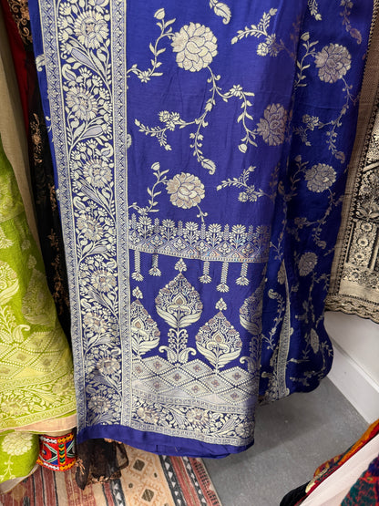 Royal blue Dola silk saree color variant with detailed gold zari woven floral design.