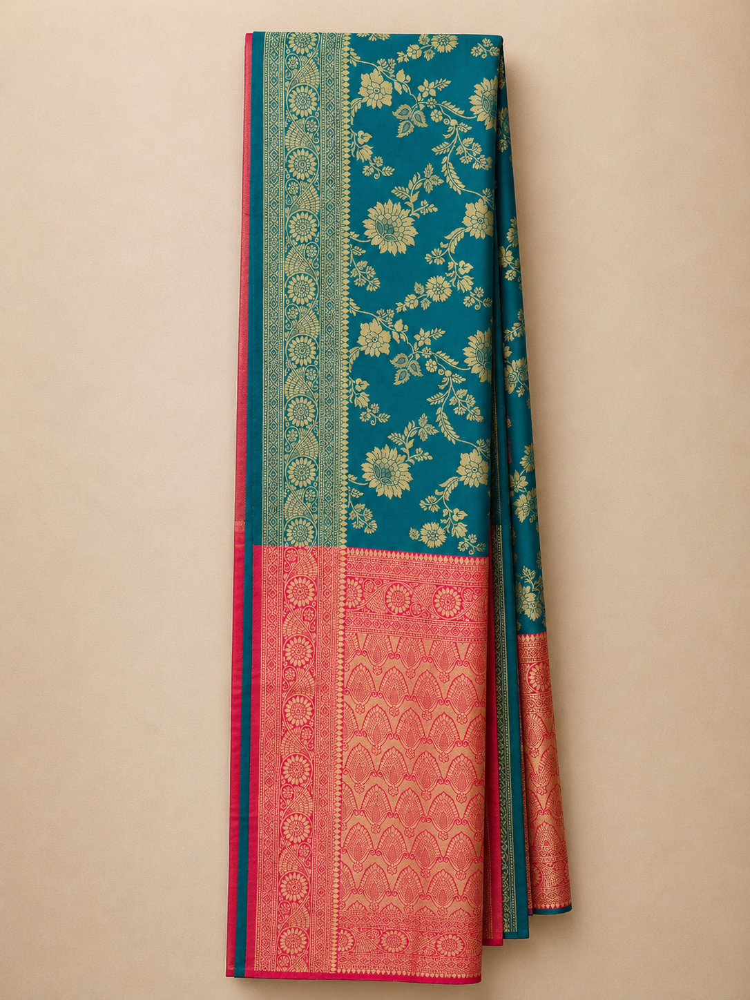 Folded Teal Blue Banarasi Art Silk Saree Showing Rich Gold Zari Floral Weaving and Contrast Border