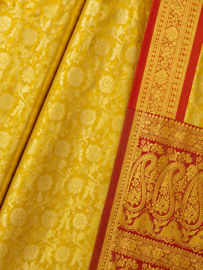 Close-up of Yellow Banarasi Silk Saree with Gold Floral Zari Weaving and Red