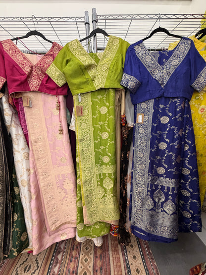 Dola silk saree color options in baby pink, olive green, royal blue, maroon, black, and additional available shades.
