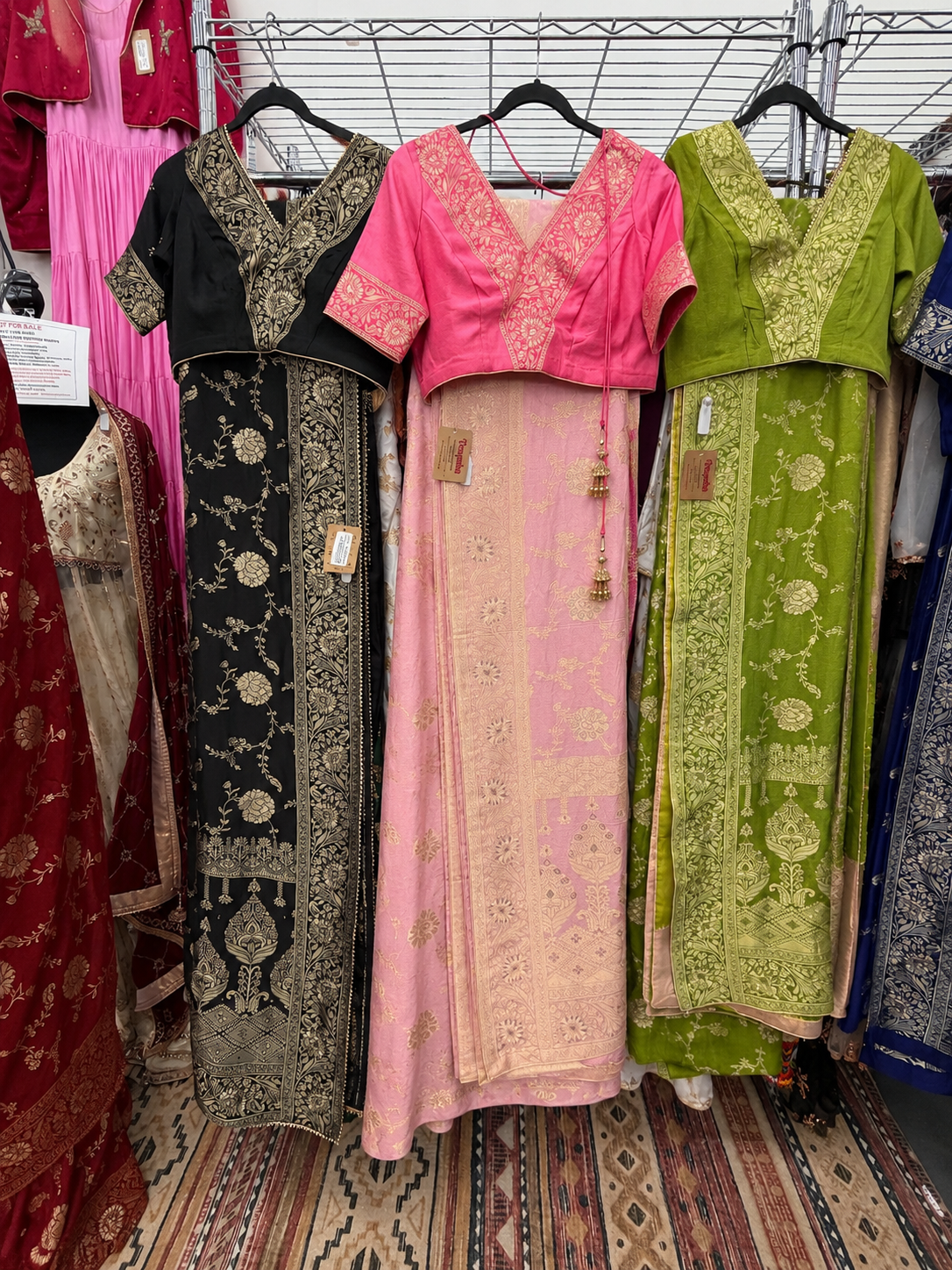 Dola silk saree color options in baby pink, olive green, royal blue, maroon, black, and additional available shades.