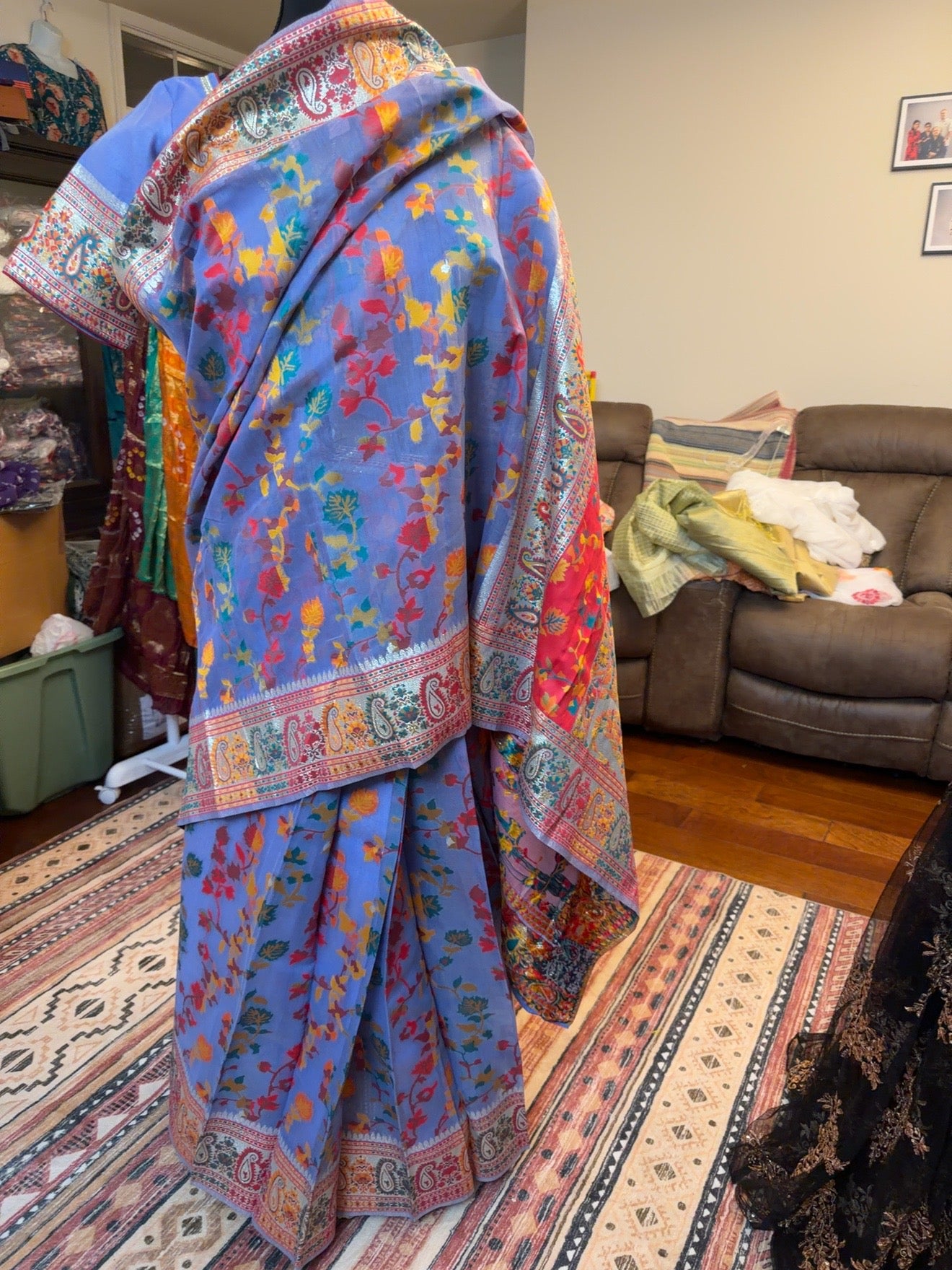 Purple pre-stitched Chanderi silk jacquard saree displayed on a model, highlighting the patterned pallu and stitched drape.