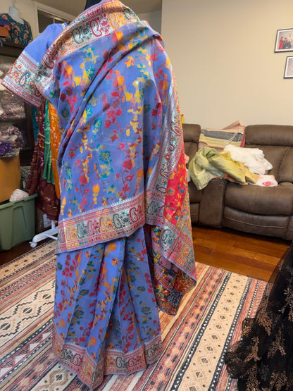 Purple pre-stitched Chanderi silk jacquard saree displayed on a model, highlighting the patterned pallu and stitched drape.
