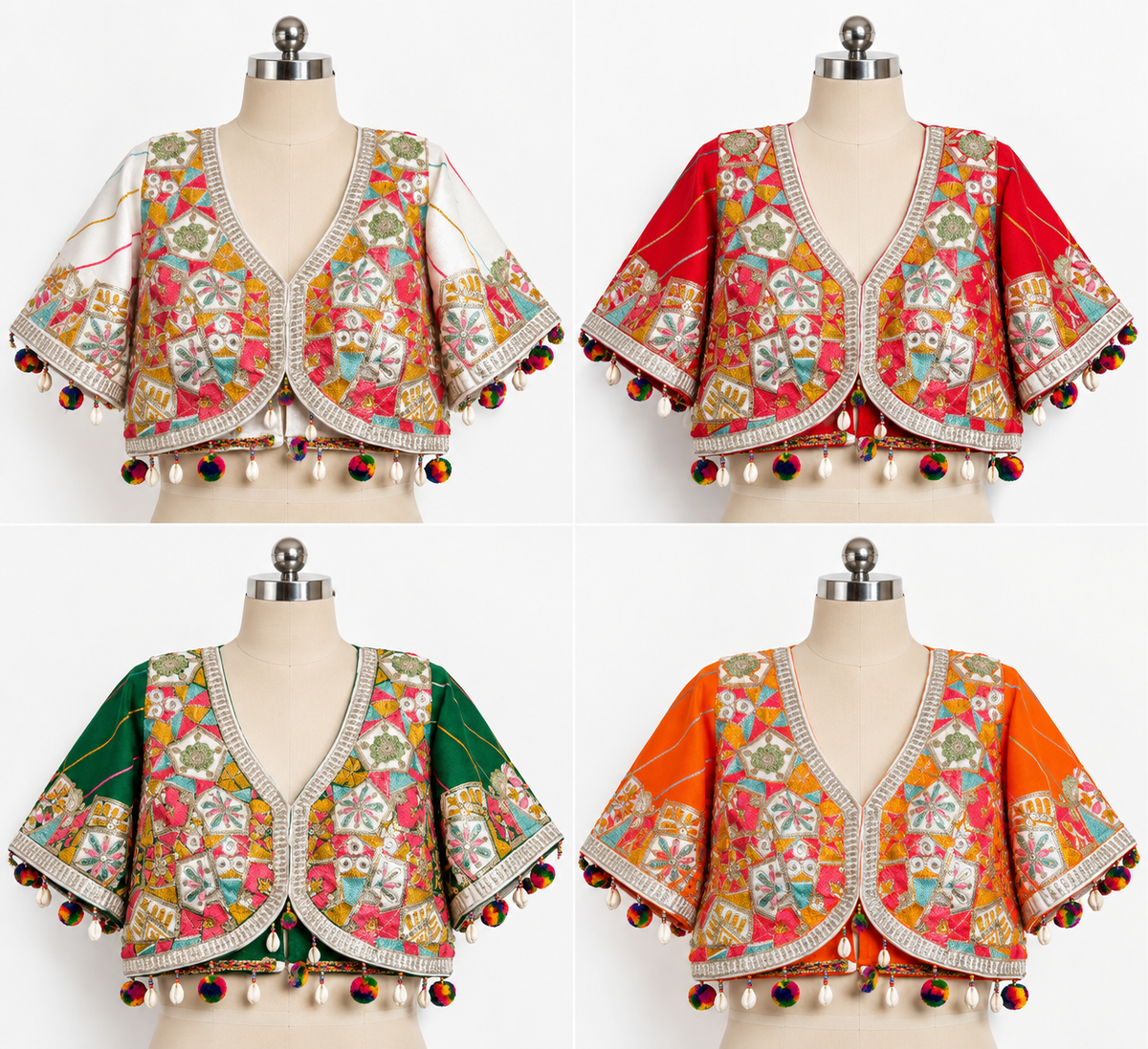 Four cropped embroidered blouses displayed on dress forms against a white background, shown in four color variants: cream, red, green, and orange. Each blouse features a V-neck, wide short sleeves, and colorful floral embroidery with pom-pom trim along the edges.