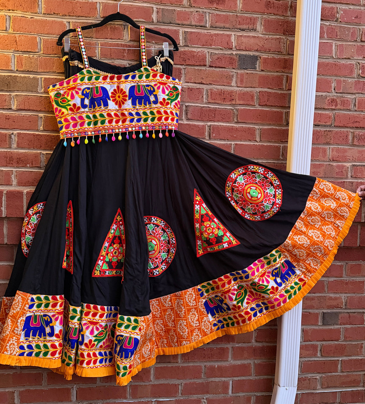 Original product photo of the black chaniya choli with multicolor embroidery, satin blouse,