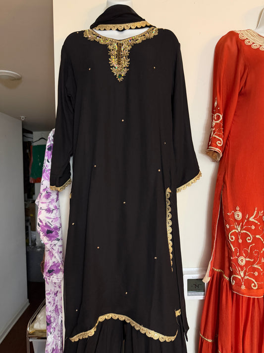 Full view of black georgette embroidered kurta with flared sharara and matching dupatta