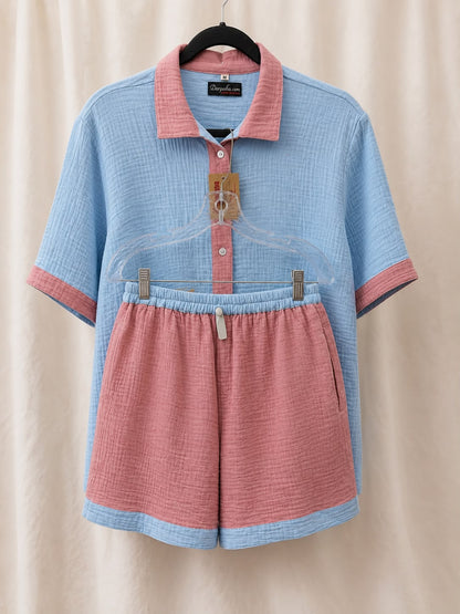 Blue and pink cotton double gauze pajama set displayed on hangers