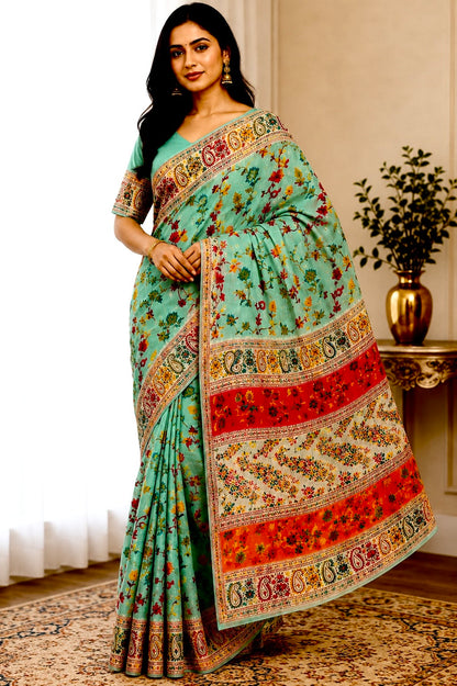 Model wearing a green Chanderi silk jacquard saree with multicolor floral print and a traditional patterned border.