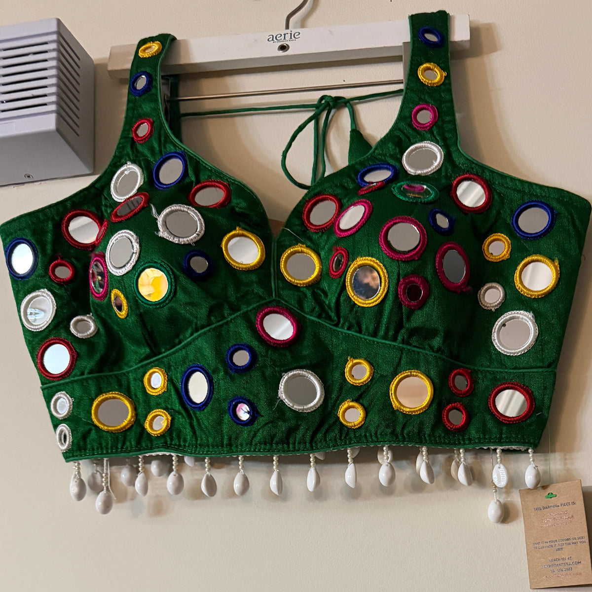 Deep green mirror work Navratri designer blouse with colorful circular mirrors and pearl drops