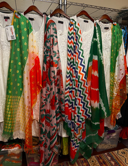 White Lucknowi embroidered muslin suits with floral, zigzag, tie-dye and colorful tricolor dupatta options