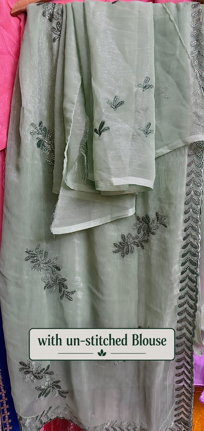Pistachio green shimmer tissue chiffon saree with embroidered motifs, detailed border and un-stitched blouse