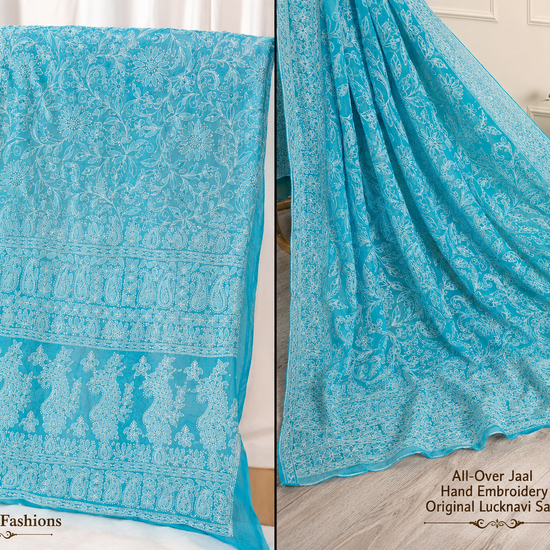 sky blue pure georgette saree highlighting intricate white floral embroidery, paisley motifs, and elegant embroidered border.