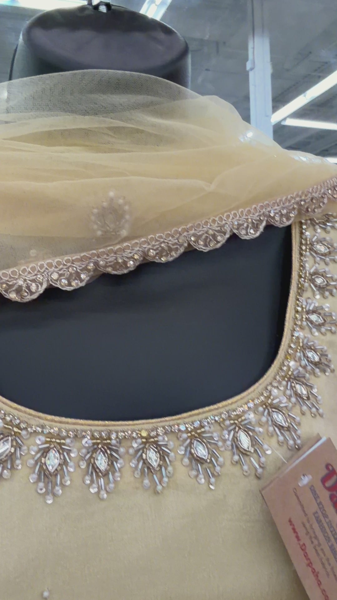 Detailed view of handcrafted Gota Work border and embroidery on premium mustard yellow Chinon dupatta.