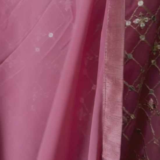 Video of pink and sage Georgette fabric with delicate sequin and zari embroidery