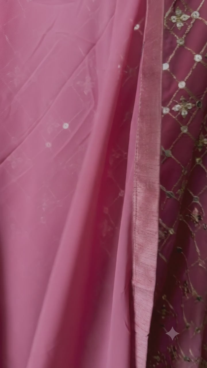 Video of pink and sage Georgette fabric with delicate sequin and zari embroidery