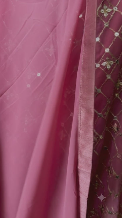 Video of pink and sage Georgette fabric with delicate sequin and zari embroidery