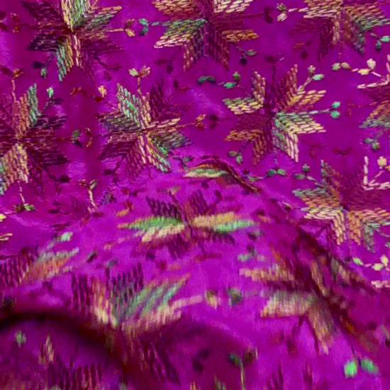 Video of multicolor Kanchan Phulkari style Chinnon sarees in black, orange and magenta