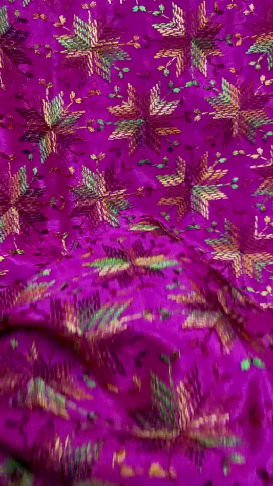 Video of multicolor Kanchan Phulkari style Chinnon sarees in black, orange and magenta