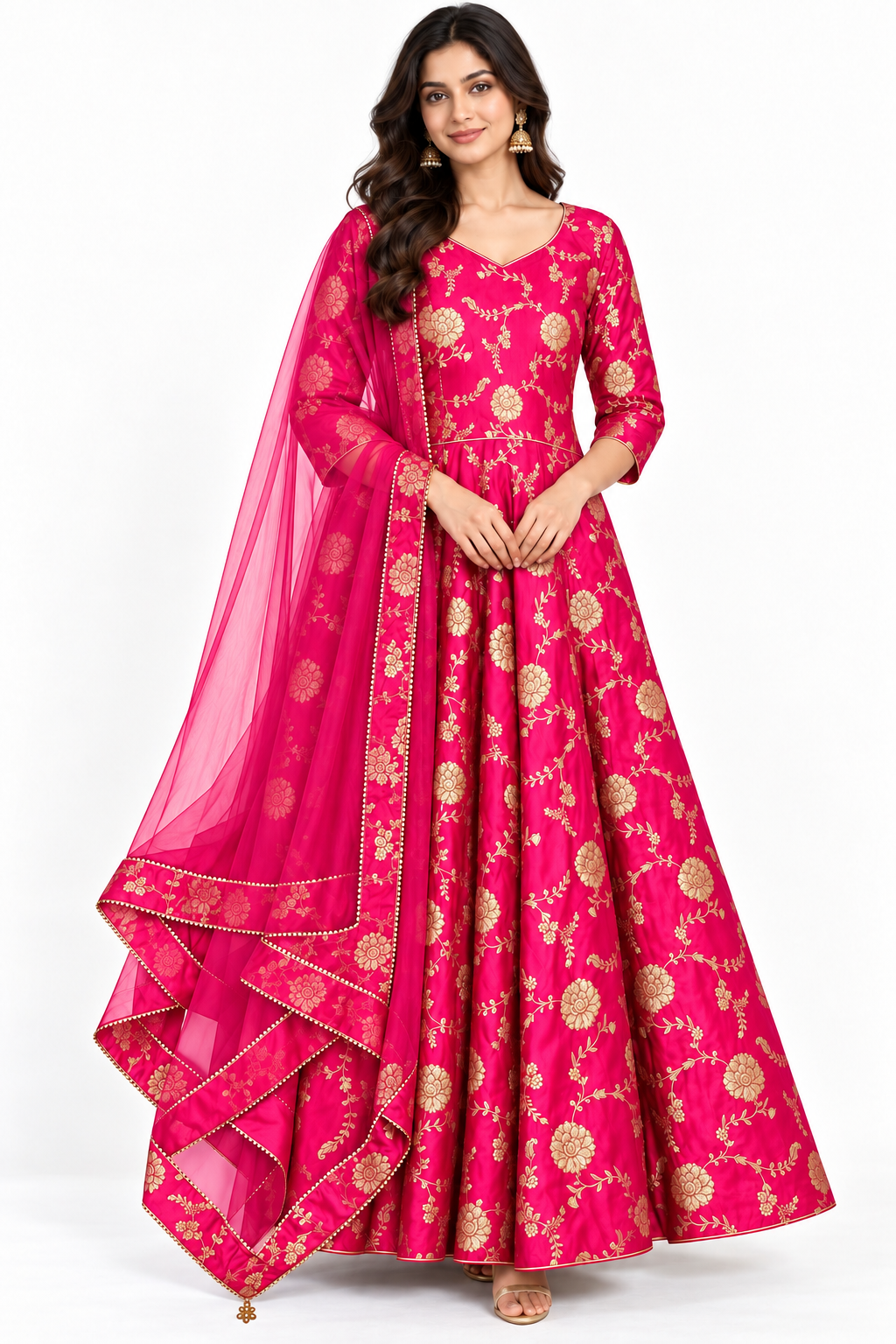 Full view of Rani pink Dola silk jacquard Anarkali dress with gold floral motifs and flared silhouette