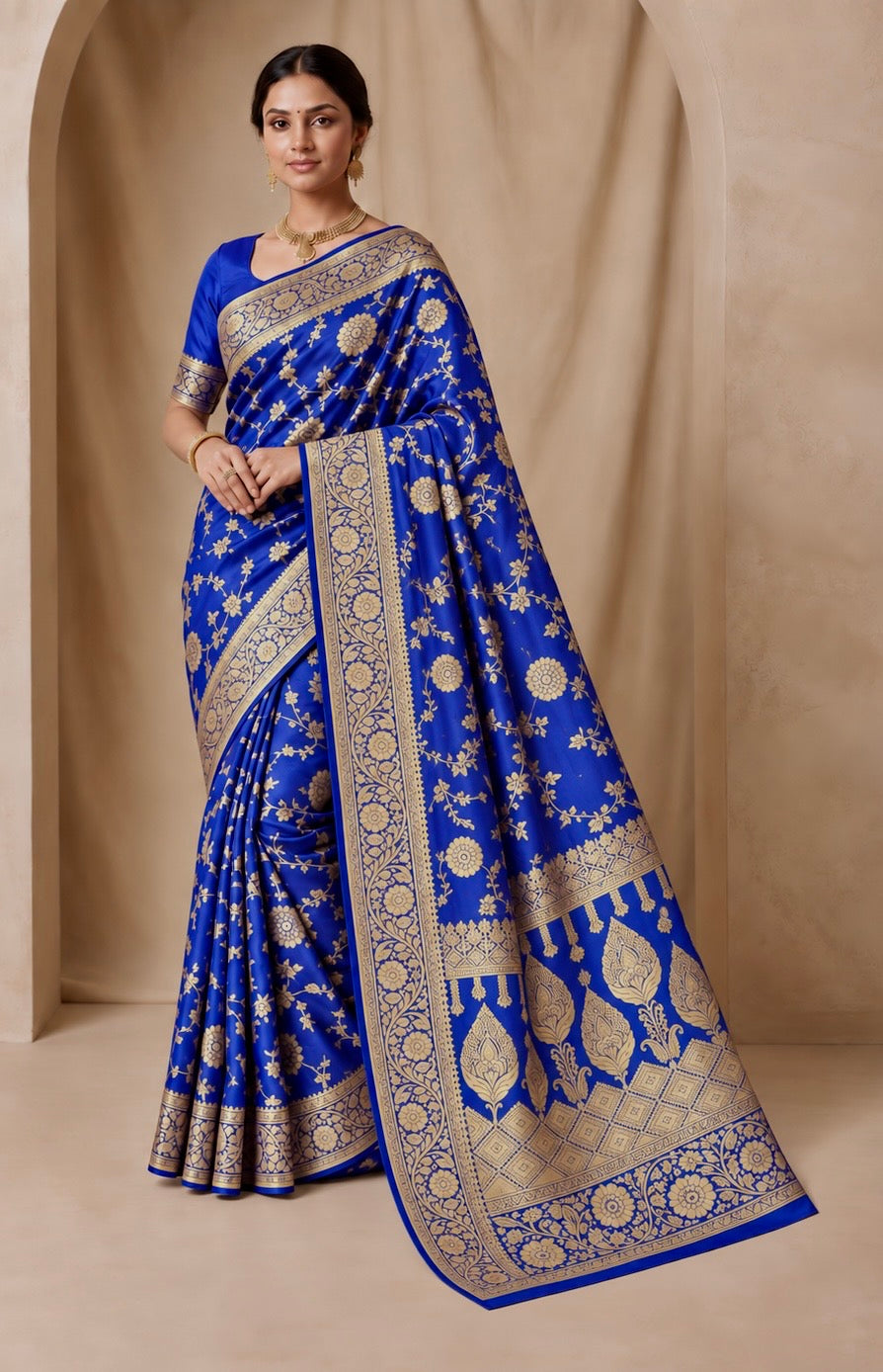 Royal blue jacquard zari saree with gold floral border and traditional woven pallu