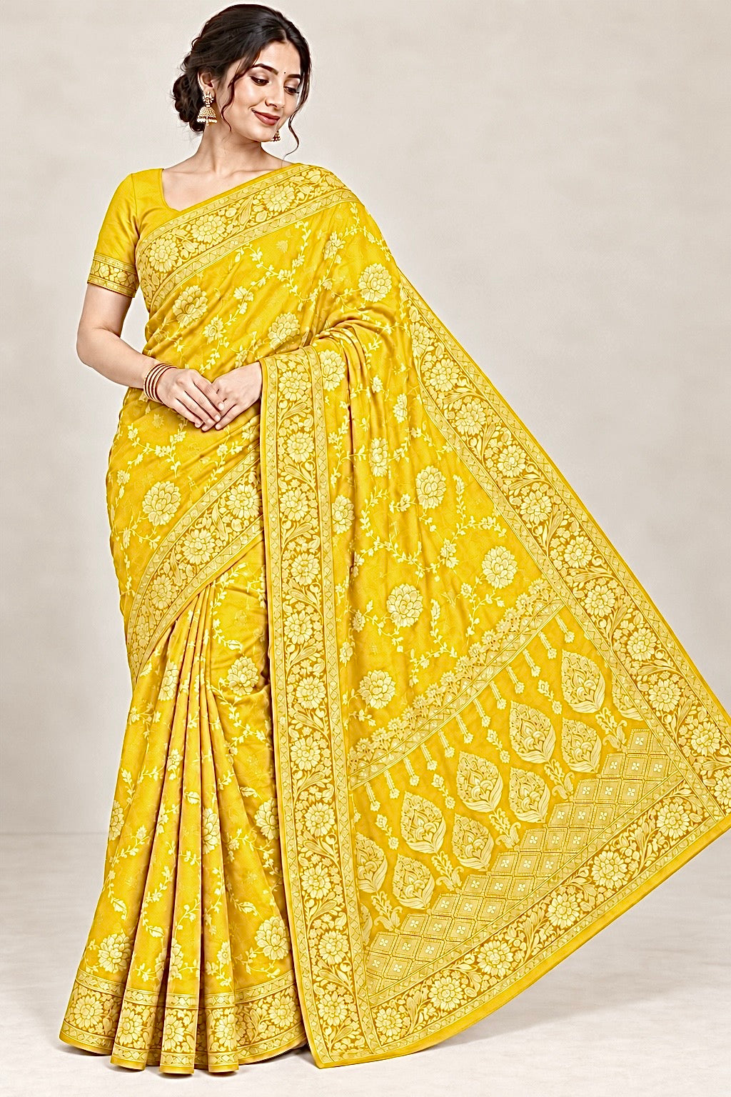 Yellow jacquard zari saree with gold floral border and traditional woven pallu